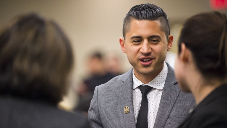 Adjunct Professor and alum Aaron Brieno speaking at an immigration rights panel