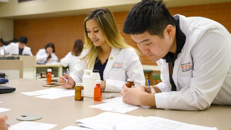 pharmacy students in compounding lab