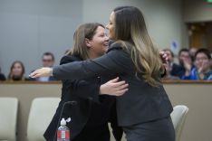 students hug after competing in the gls final four