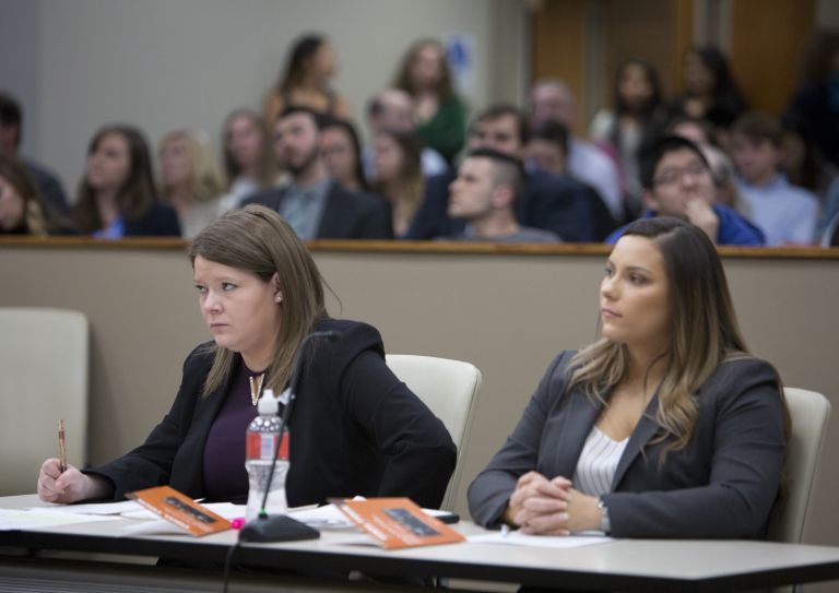 two students attentive during the 2018 final four