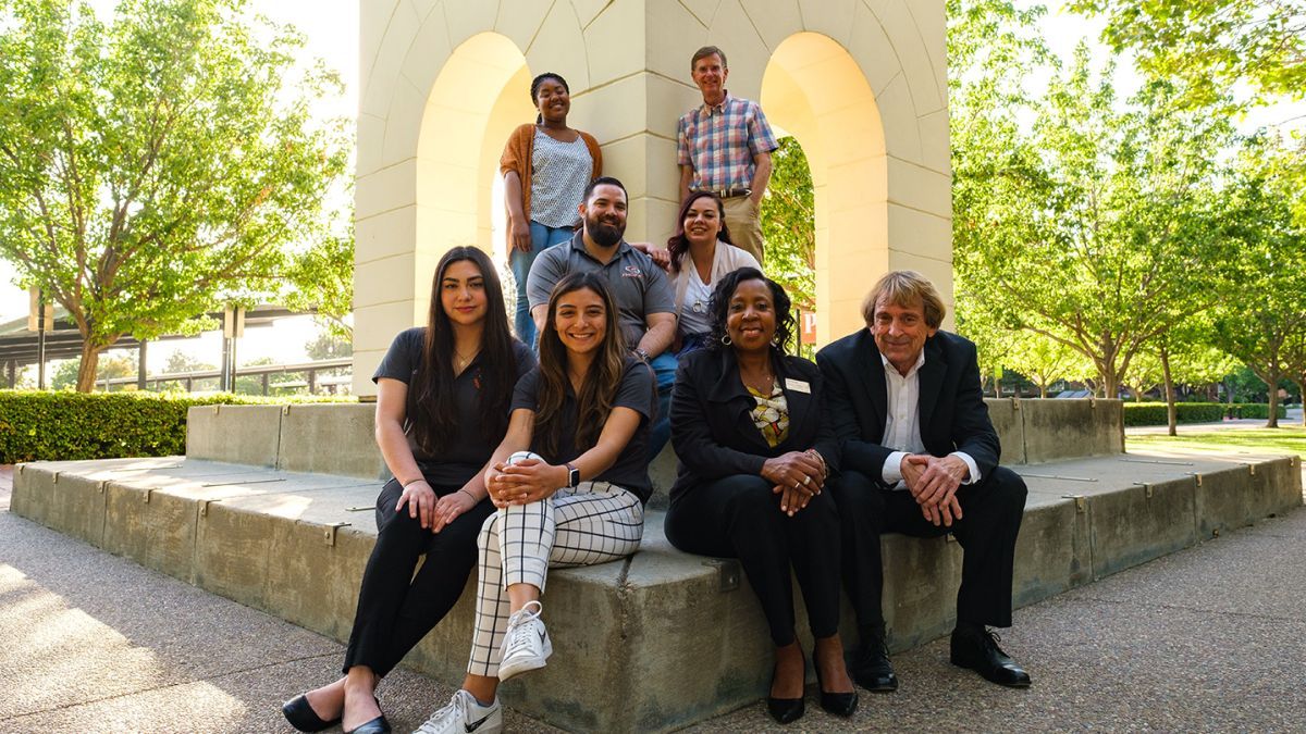 The current forensics team at the Atchley Clock Tower with 2 alumni mentors.