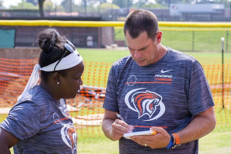 Women's soccer co-head coaches Danesha Adams and J.J. Wozniak.