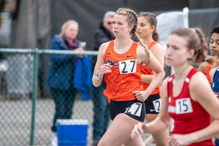 student-athletes running in track competition