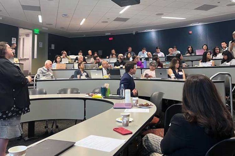 people gathered in a conference room