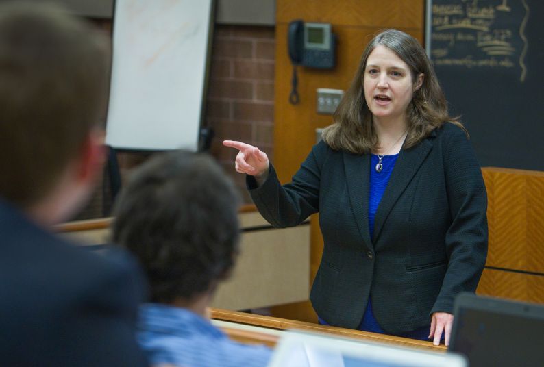 Female professor teaching in the classroom 