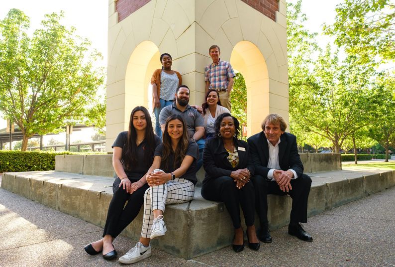 The current forensics team at the Atchley Clock Tower with 2 alumni mentors.