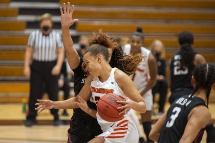 Valerie Higgins playing basketball