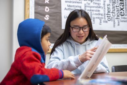 Child being read book