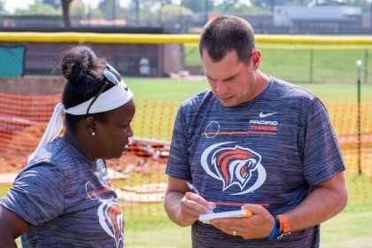 Women's soccer co-head coaches Danesha Adams and J.J. Wozniak.