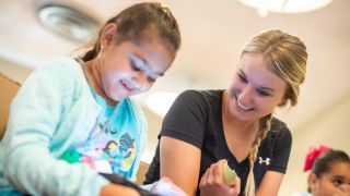 student with child patient