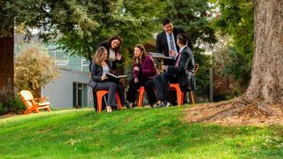 group of students studying on campus