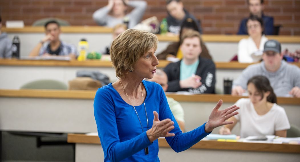 law professor teaches in a classroom