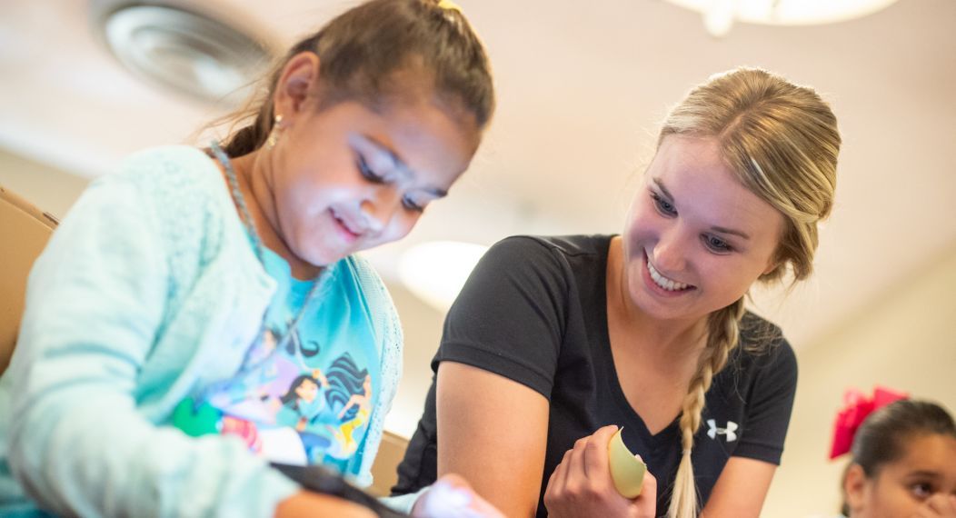 student with child patient