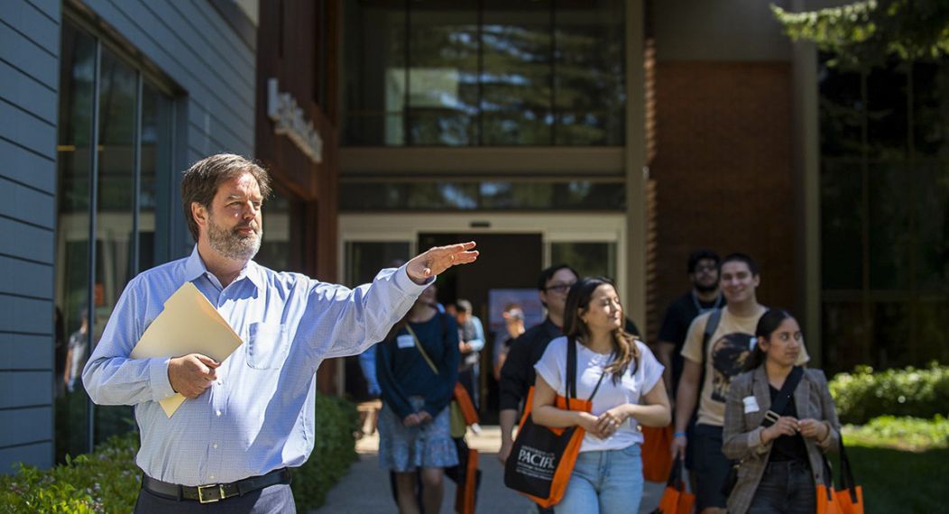 a man leads a tour group