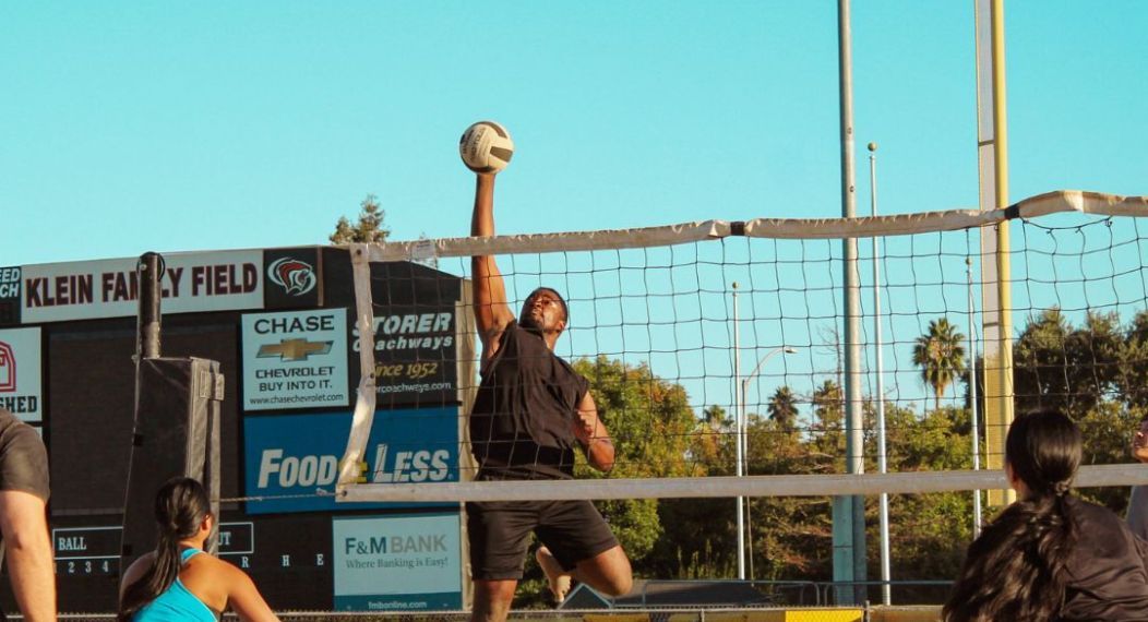 students playing volleyball