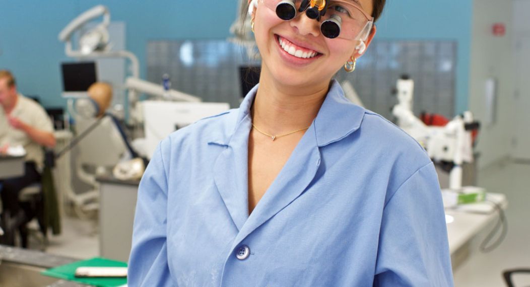 Student with magnifiers