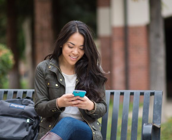 student using mobil phone