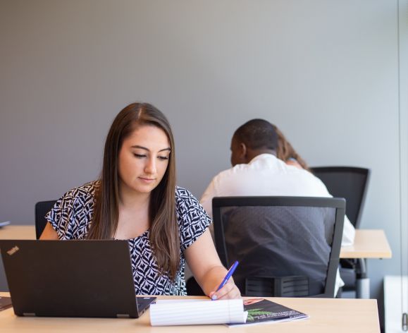 student working at laptop