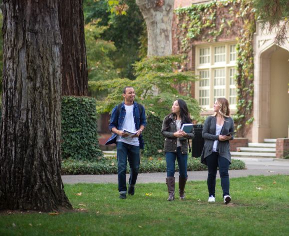 students walking on knoles lawn