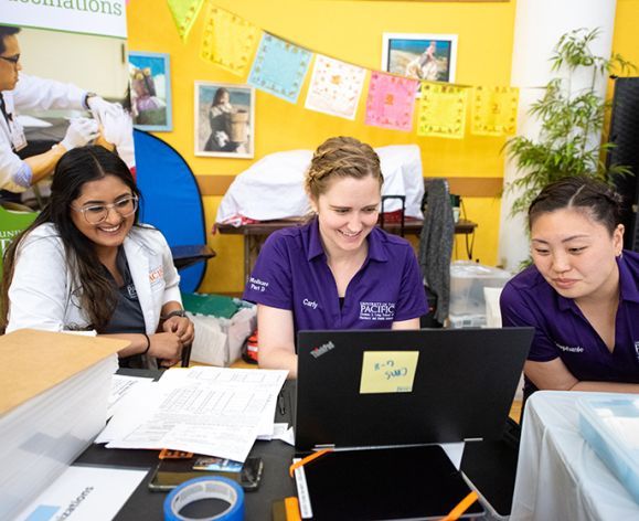 Carly Ranson with PharmD students at a Medicare Part D Outreach Clinic