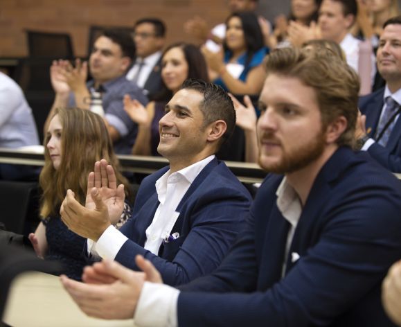 students clapping