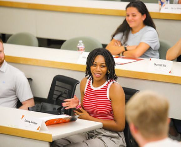 students talking in class