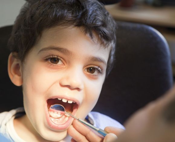 kid in dental chair