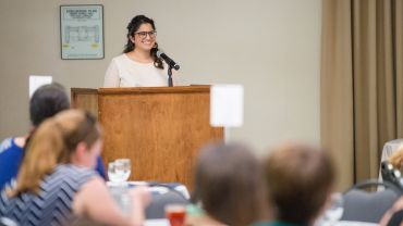 Pacific alumna Marukh Hasan speaking at an event